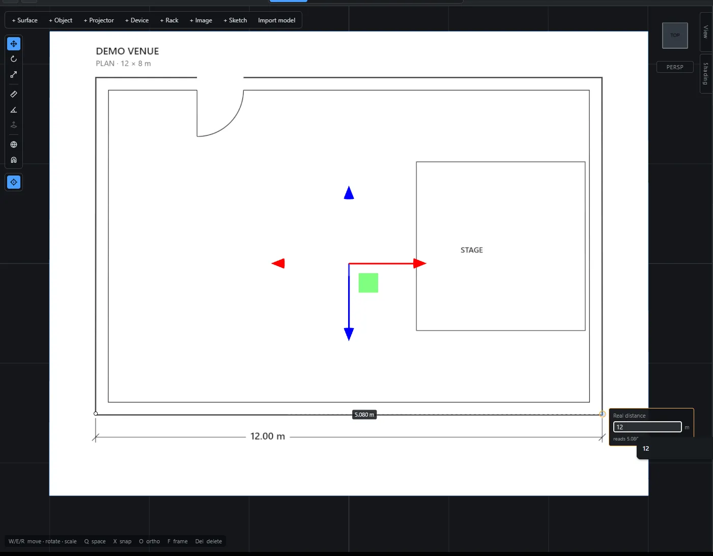 A floor plan placed flat in the 3D venue, with a dimension across it and the calibration value being typed in.